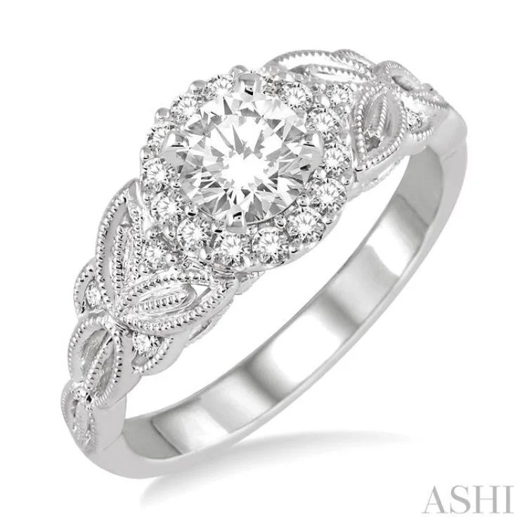 1/4 Ctw Diamond Semi-mount Engagement Ring in 14K White Gold