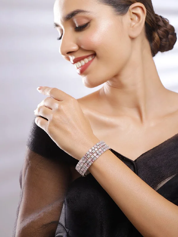 Set Of 4 Rhodium-Plated Crystal Bangles.